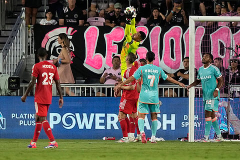 Inter Miami goalkeeper Drake Callender makes a save